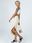   side view of model wearing Princess Polly Abigail Midi Skirt Cream 