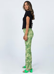 side view of model wearing Princess Polly Motel Heny Trouser Blurred Floral Green 