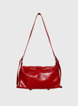 Shoulder bag Faux leather, adjustable strap, zip and button closure, silver-toned hardware, flat base, internal pockets