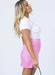   side view of model wearing Princess Polly Selby Mini Skirt Pink Leopard 