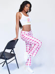 side view of model wearing Princess Polly Zoey Argyle Straight Leg Pant Pink 