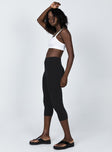 side view of model wearing Princess Polly The Highway Capris 