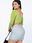 back view of model wearing Princess Polly Cove Mini Skirt Green 