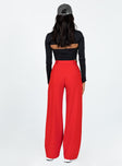 Front view of model wearing  front Princess Polly High Waisted Pants High Waisted Pants High Waisted Pants High Waisted Pants  Archer Pants Red