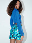 back view of model wearing Princess Polly Caleb Mini Skirt Blue 