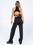 back view of model wearing Princess Polly Ramone Pants Black 