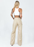 back view of model wearing Princess Polly Miami Vice Pants Wheat Low Rise Jeans 