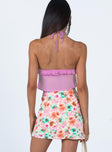 back view of model wearing Princess Polly Selby Mini Skirt Yellow Floral 