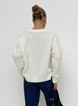 back view of model wearing Princess Polly Canlish Cable Sweater Cream 