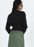 Black sweater Ribbed knit material Mock neck Knot detail at bust Drop shoulder