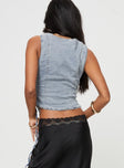 Front view of model wearing  front Princess Polly Sleeveless High Neck  Stavia Vest Top Denim