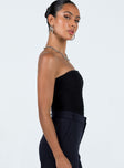 Front view of model wearing  front Princess Polly Sleeveless Asymmetric Neckline  Makena Strapless Bodysuit Black