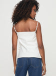 back view of model wearing Princess Polly Novalie Top White Sleeveless Square Neck 