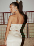 back view of model wearing Princess Polly Suga Strapless Top Cream Sleeveless Sweetheart 