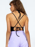 back view of model wearing Princess Polly Renzo Bodysuit Black Sleeveless Plunger 