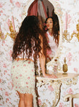 back view of model wearing Princess Polly Bouket Mini Skirt Cream Floral Mini Skirts 