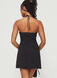 back view of model wearing Princess Polly Fusilloni Mini Dress Black Sweetheart Neckline 