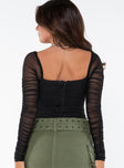 back view of model wearing Princess Polly Delany Bodysuit Black Petite Full Sleeves Square Neck 