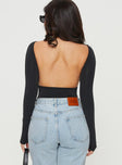 back view of model wearing Princess Polly Gatewood Long Sleeve Bodysuit Black Petite Full Sleeves Boat Neck 