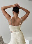 Front view of model wearing  front Princess Polly Sleeveless Square Neck  Beeby Knit Top Cream