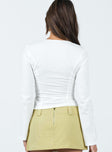 Front view of model wearing  front Princess Polly Full Sleeves Square Neck  Linsley Long Sleeve Top White