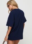 back view of model wearing Princess Polly Goal France Oversized Tee Blue Half Sleeves Crew Neck 