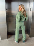 Front view of model wearing  front Princess Polly High Waisted Pants High Waisted Pants High Waisted Pants  Arya Straight Leg Track Pants Green