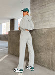 Front view of model wearing  front Princess Polly Low Rise Pants Low Rise Pants Low Rise Pants  Arya Straight Leg Track Pants Grey