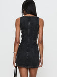 back view of model wearing Princess Polly Chatter Buckle Side Denim Mini Dress Charcoal Crew Neck 