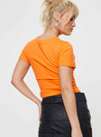 Front view of model wearing  front Princess Polly Short Sleeves Crew Neck  JGR & STN Sporte Baby Tee Tangerine