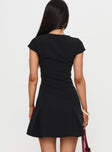 back view of model wearing Princess Polly Kolette Pleat Mini Dress Black High Neck 