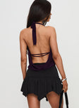 back view of model wearing Princess Polly Trianta Asymmetrical Mini Skirt Black Mini Skirts 