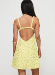 back view of model wearing Princess Polly Georgia Mini Dress Yellow Floral Plunger 