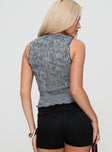 back view of model wearing Princess Polly Plastic Hearts Top Black Sleeveless Crew Neck 