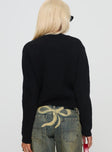 back view of model wearing Princess Polly Rosalee Cardigan Black / White Cropped 