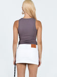 back view of model wearing Princess Polly Faya Low Rise Denim Mini Skirt White Mini Skirts 