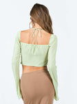 back view of model wearing Princess Polly Geneve Long Sleeve Top Green Full Sleeves Square Neck 