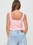 back view of model wearing Princess Polly Merrelle Top Pink Sleeveless Plunger 