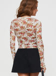 back view of model wearing Princess Polly Amessa Long Sleeve Top Floral Full Sleeves Plunger 