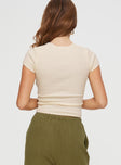 back view of model wearing Princess Polly Fincher Lace Up Top Cream Short Sleeves Scoop Neck 