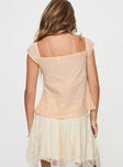 back view of model wearing Princess Polly Lunya Cap Sleeve Top Beige Short Sleeves Plunger 