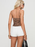 back view of model wearing Princess Polly Think Fast Shorts White High Waisted Shorts 