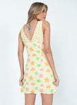 back view of model wearing Princess Polly Calan Mini Dress Spliced Floral V-Neck 