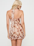 back view of model wearing Princess Polly Stockton Strapless Mini Dress Beige Floral Straight Neck 