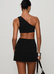 back view of model wearing Princess Polly Hardward Mini Dress Black Asymmetric Neckline 