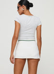 back view of model wearing Princess Polly Emberia Skort White High Waisted Shorts 