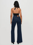 back view of model wearing Princess Polly Thearlie High Flare Jean Dark Wash High Waisted 