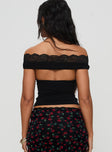 back view of model wearing Princess Polly Amarena Off The Shoulder Lace Top Black Short Sleeves 