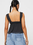 back view of model wearing Princess Polly Mooney Top Black Sleeveless Square Neck 