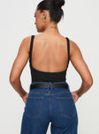 back view of model wearing Princess Polly Nellie Bodysuit Black Sleeveless Plunger 